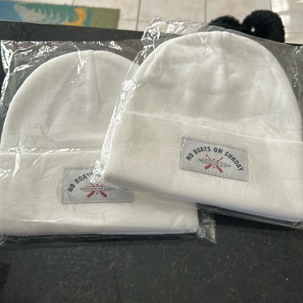 No Boats on Sunday Toques. Never worn still in bag.